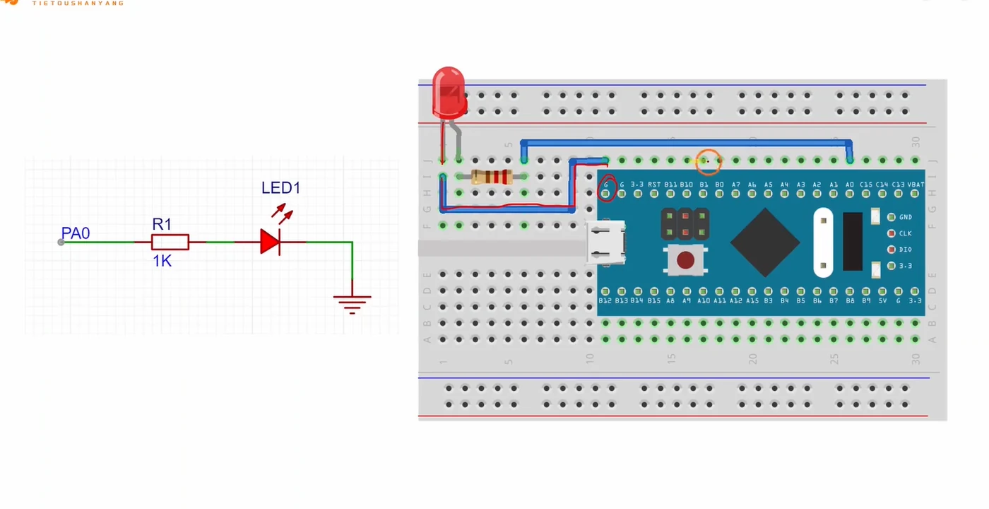 本次实验的面包板实物接线：PA0 经 1K 电阻串 LED 到地，写 1 即点亮
